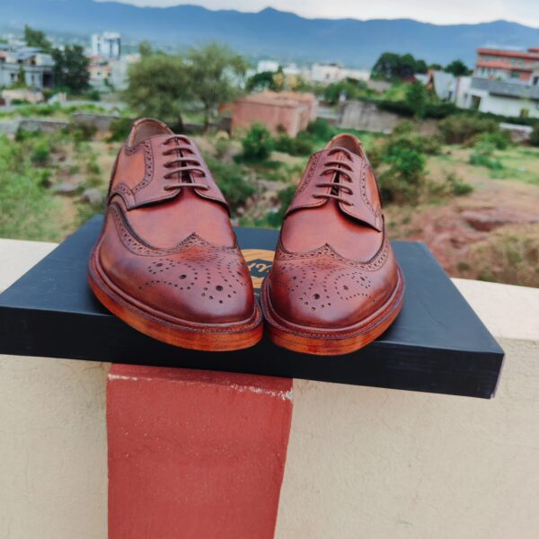 Handmade wingtip derby shoes with double leather sole and Goodyear welt by Handmade Artisans